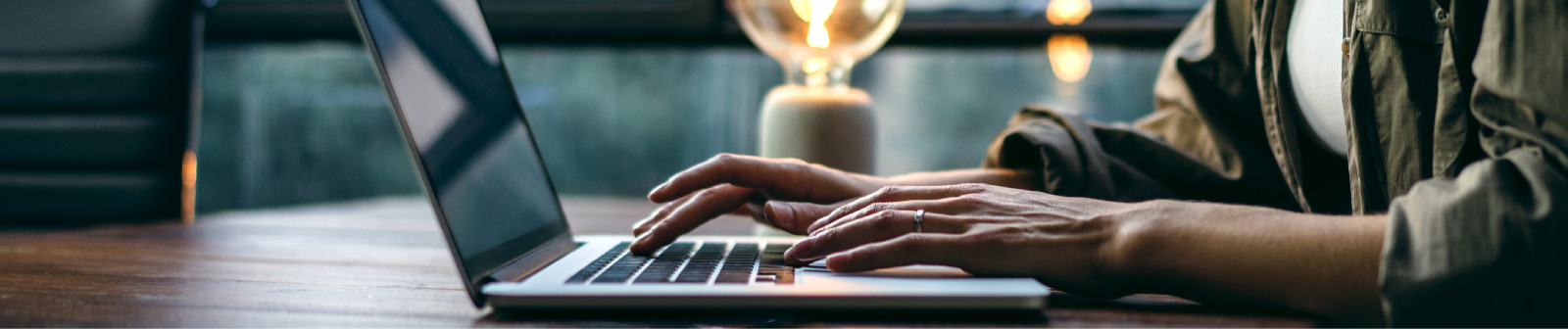 Laptop and person typing