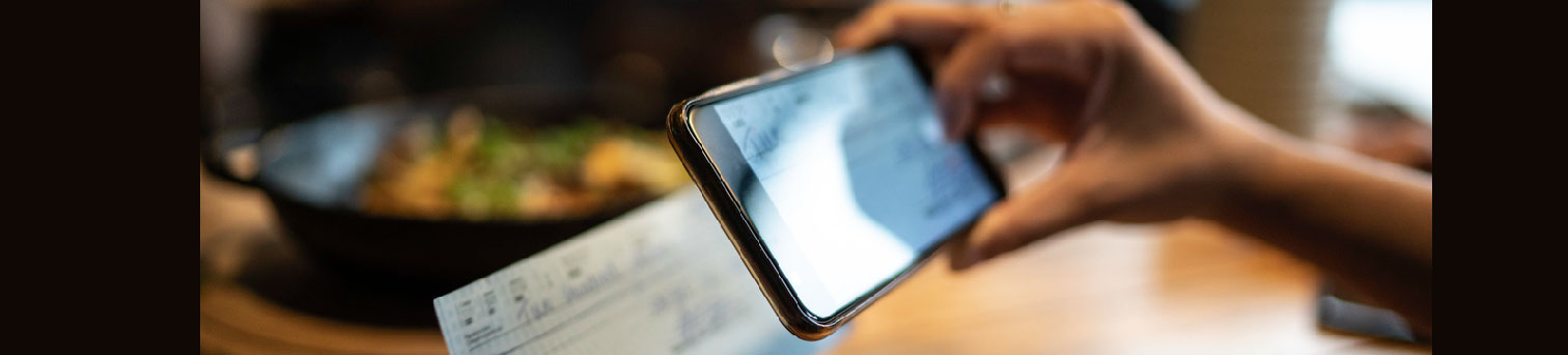 someone taking a photo of a check